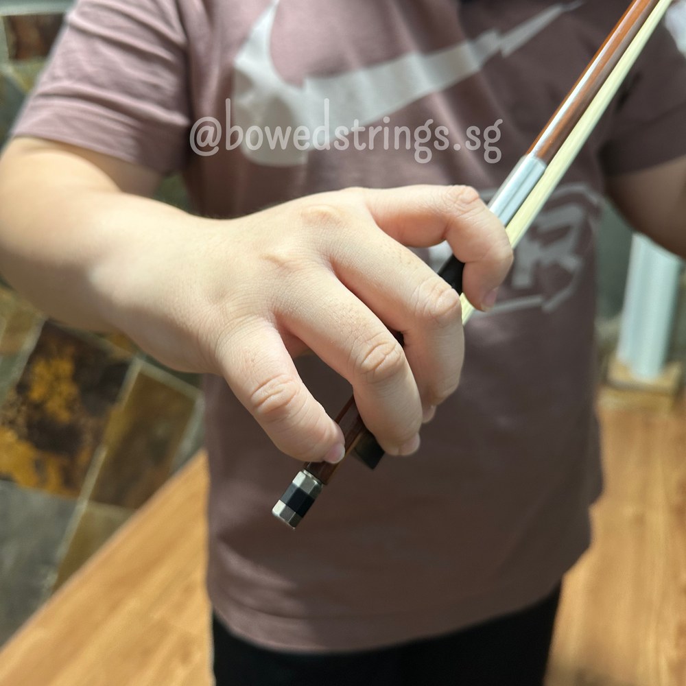 Close-up of correct bow hold technique
